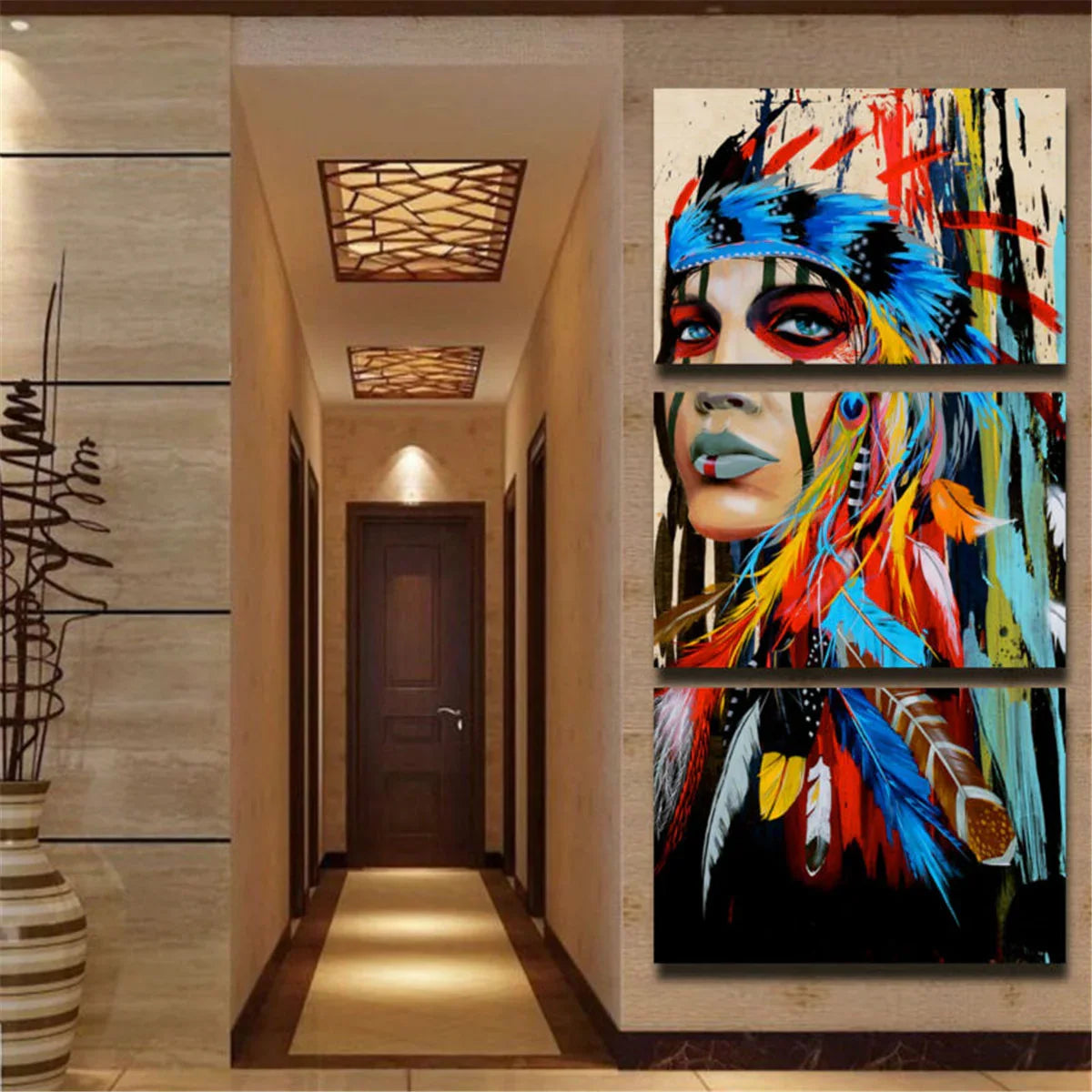 Modern hallway with colorful abstract canvas wall art featuring a painted face and feathers